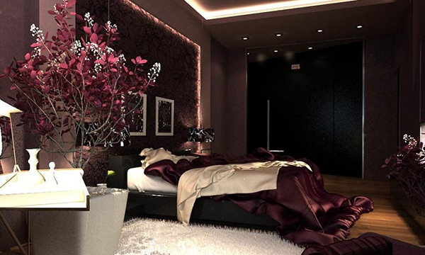 chambre luxueuse aux couleurs violet foncé